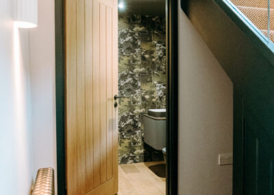 Armada property stone farm project - Beautiful rustic farm house hallway to bathroom