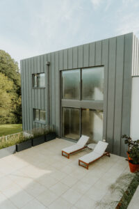 Armada property the Oaks project - modern contemporary new build cladding with roof garden